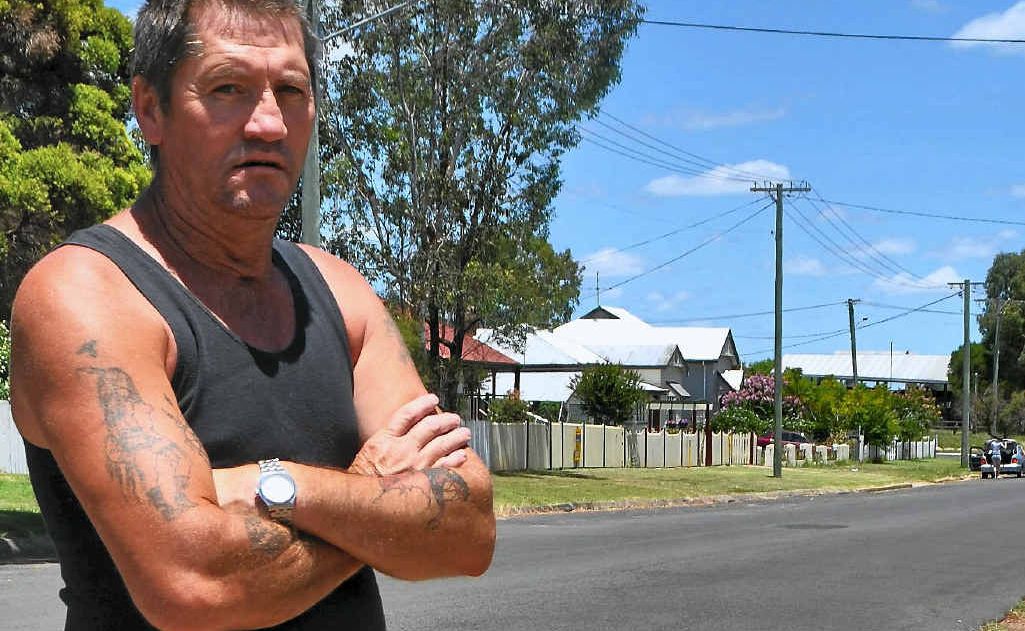 Guy Harvey surveys the hoon track marks left out the front of his Fitzroy St residence. Guy Harvey surveys the hoon track marks left out the front of his Fitzroy St residence.
